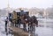 The carriage drawn by two horses at the Palace Square