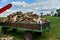 Carriage with sawn and chipped firewood prepared for the winter to heat the room