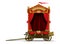 A carriage scene of a roving theater on wheels with a red curtain and decorations isolated on white