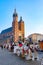 Carriages for riding tourists on the background of Mariacki cathedral