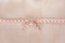 Carrick bend ship knot on wooden background