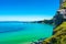 Carrick a Rede Rope Bridge in Ballintoy, Northern Ireland. Beautiful Landscape on Coast of Atlantic Ocean, Clear blue and green wa