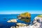 Carrick a Rede Rope Bridge in Ballintoy, Northern Ireland. Beautiful Landscape on Coast of Atlantic Ocean, Clear blue and green wa