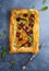 Carrot and Beet Tart with pesto and phyllo dough. Savoury vegetable baking. Homemade vegetarian food.Top view