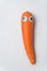 Carrot character with Googly eyes and funny face. Vertical frame