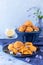 Carrot cookies for breakfast or snack on a blue background. Healthy vegan food.