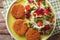 Carrot cutlets with fresh vegetable salad close-up. horizontal t