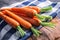 Carrot. Fresh Carrots bunch. Baby carrots. Raw fresh organic orange carrots. Healthy vegan vegetable food