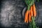 Carrot. Fresh Carrots bunch. Baby carrots. Raw fresh organic orange carrots. Healthy vegan vegetable food. Fresh Vegetable