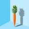 Carrot with pineapple leaves on pastel blue background. Easter minimal concept