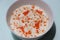 Carrot raita, side dish with Indian meal, curd seasoned with carrot and spice