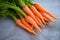 Carrot on table background, Fresh and sweet carrots for cooking food fruits and vegetables for health concept, baby carrots bunch