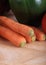 Carrot vegetables on wooden chopping board