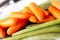 Carrots and green beans. Macro shoot. High quality photo.