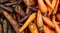 Carrots. Half of carrots pure, half carrots are groa. Vegetables. Textured background from fresh large orange carrots. Background