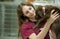 Carrying a cute brown lab puppy at the vet\'s