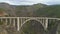 Cars on Bixby Creek Bridge. Big Sur, California, USA. Aerial View