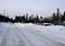 Cars blocked by tall snow banks