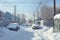 cars buried under heavy snow with only antennas visible