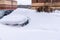 Cars buried under the snow