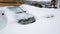 Cars buried under the snow