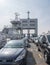 Cars on busy Woolwich Ferry across River Thames in London