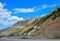 Cars carefully navigate the switchbacks to the summit of the Beartooth mountains.