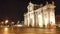 Cars circulating in the plaza de la Puerta de Alcala in Madrid at night