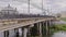 cars and citizens passing over an old bridge over Upa river in Tula, Russia - September 23, 2021