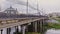 cars and citizens passing over an old bridge over Upa river in Tula, Russia - September 23, 2021