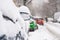 Cars Covered With Fresh White Snow After A Heavy Blizzard In Bucharest