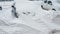 Cars covered by snow after a snow blizzard. Residential building in the background.