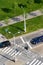 Cars crosing crossroad with crosswalk and bike crossing, aerial view