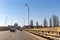 Cars crossing the bridge over Bistrita river at the entrance into Bacau city