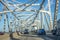 cars crossing the Mississippi at Baton Rouge at the old historic Horace Wilkinson bridge in Baton Rouge, Louisiana