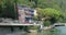 Cars drive along the coast of Lake Garda