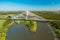 Cars drive on cable-stayed Redzinski Bridge over river