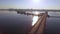 Cars drive over the great North bridge. Voronezh. Camera from bottom to top