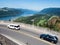 Cars driving along a scenic route near Crown Point Vista House in Columbia River Gorge