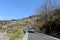 Cars driving through a curvy mountain road