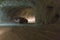 Cars driving into a tunnel from Slanic Prahova salt pan