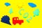 Cars emitting carbon dioxide. Pollution concept. harm the environment. Car and smoke cutout on yellow background top