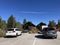 Cars of Grand Canyon National Park visitors wait in line at South Rim toll booths. Entrance fees sign - Arizona, USA - October,