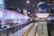 Cars headlights lighting up the Olympic Bridge named Gorinbashi in Harajuku at night.