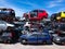 Cars in junkyard, pile for recycling