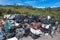 Cars in junkyard, pressed and packed for recycling