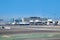 cars and loaders ready to unload next aircraft, United Airlines aircrafts standing at the terminal gates ready for boarding