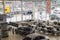 Cars, manager and customer in showroom of dealership AVTOVAZ named SeverAvto in Kirov city in 2018. Top view