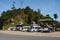 Cars and minivans parked at the Doi Kio Lom viewpoint in Northern Thailand