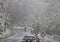 Cars and motorbikes in a snowstorm, Austria